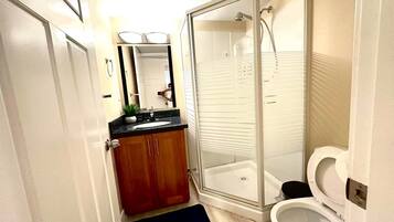 Hair dryer, towels, soap, toilet paper