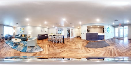 Lobby sitting area. WoodSpring Suites Savannah West - Ellabell Metaplant