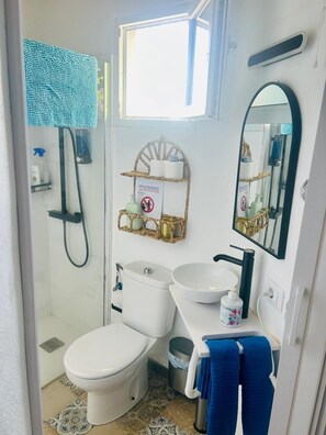 Hair dryer, towels, toilet paper