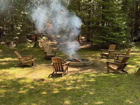 Property grounds. Knotty by Nature! Firepit and Parking! Less than a mile to trails and the lake!