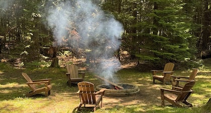Knotty by Nature! Firepit and Parking! Less than a mile to trails and the lake!
