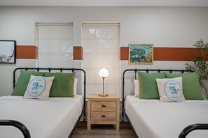 4 bedrooms, desk, iron/ironing board, travel cot