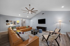 Smart TV, fireplace, table football, computer monitors