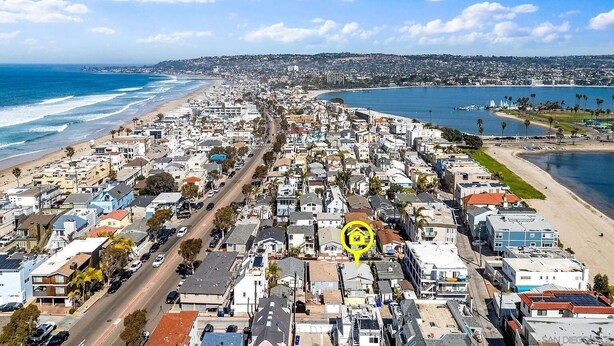 A coastal cityscape with a dense residential area, a beach, and a marina. - Cozy Cottage Between the Beach & Bay East – Walk to Water! (San Diego)