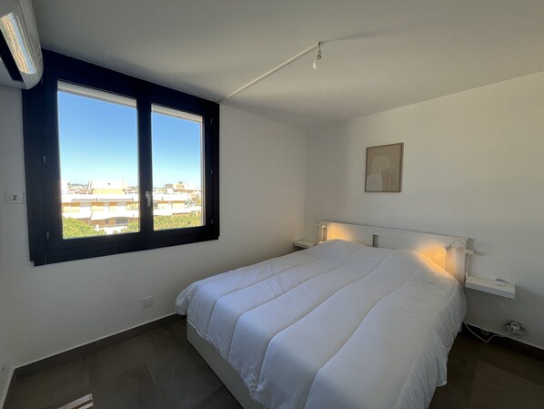 2 dormitorios, tabla de planchar con plancha, wifi gratis y ropa de cama