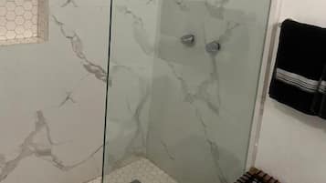 Shower, towels, soap, shampoo