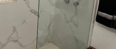 Shower, towels, soap, shampoo