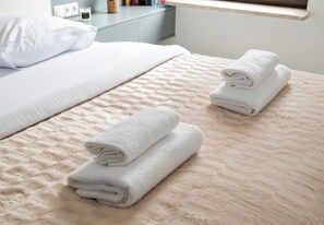 1 habitación, tabla de planchar con plancha, wifi y ropa de cama 