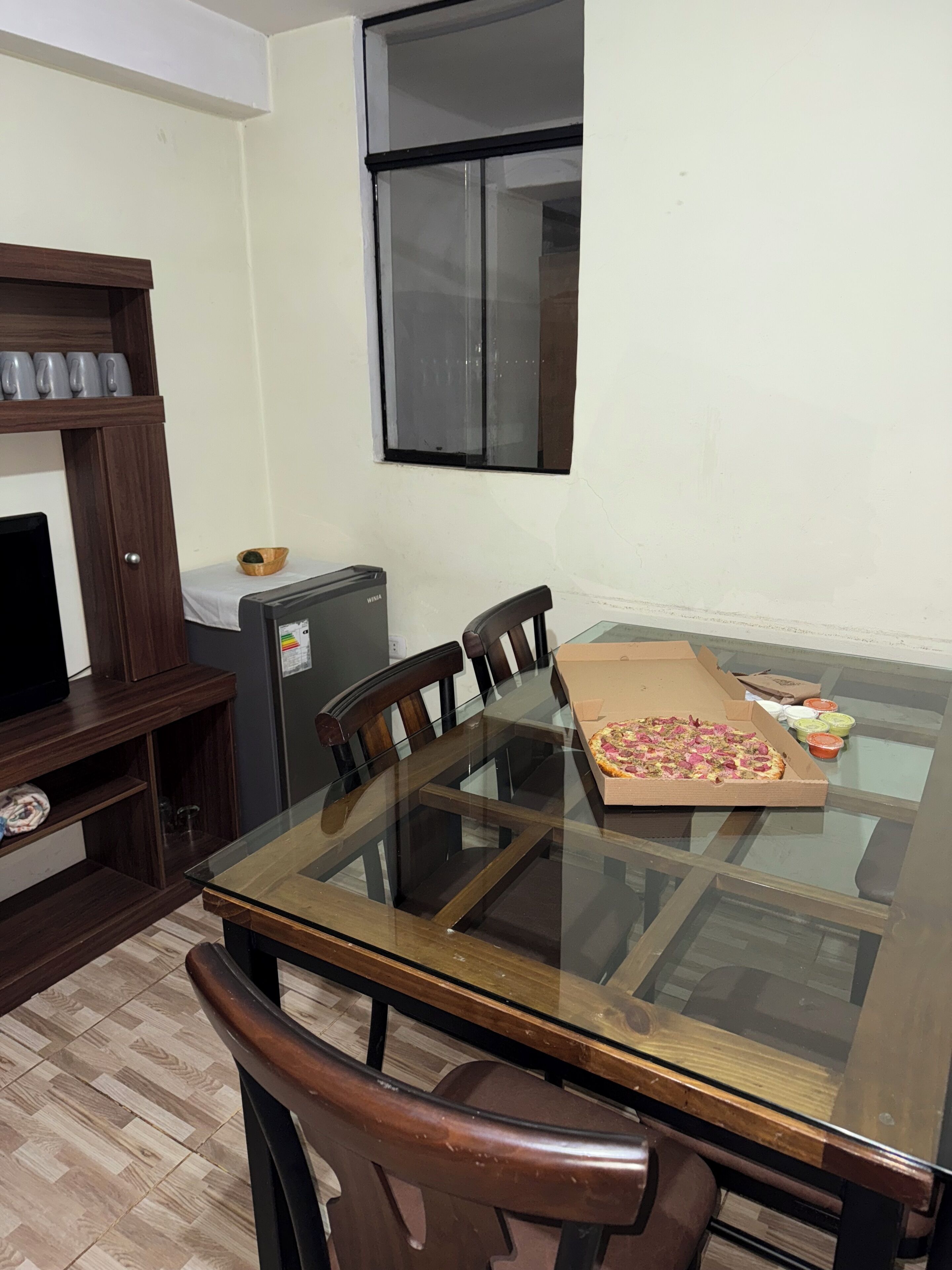 Full-sized fridge, microwave, stovetop, cookware/dishes/utensils