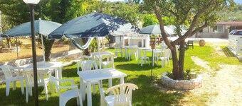Maison de vacances 'Villa Elvira Trilocale' avec terrasse privée, jardin partagé et climatisation