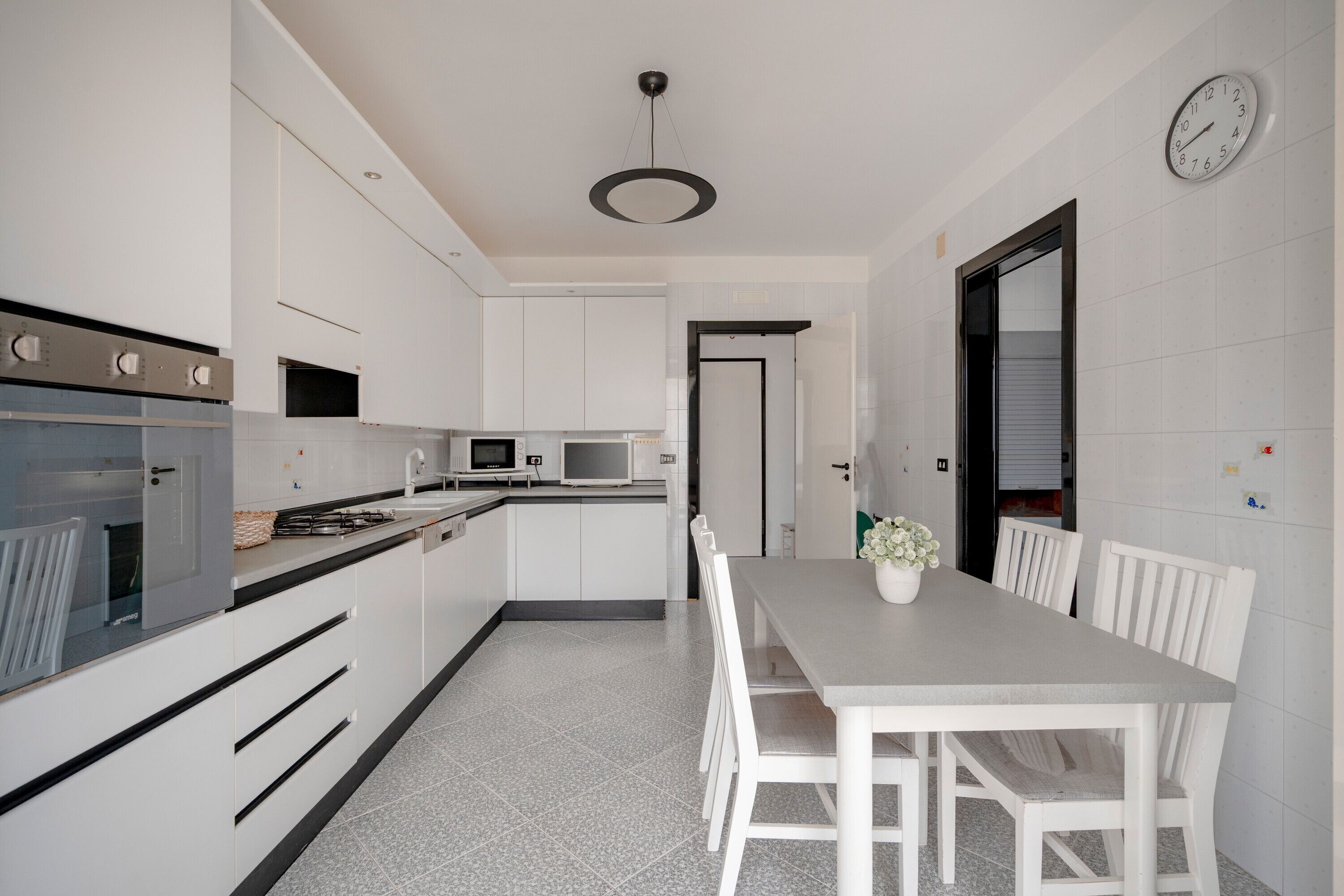 Fridge, dishwasher, coffee/tea maker, cookware/dishes/utensils