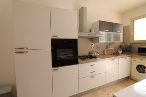 Fridge, oven, stovetop, high chair