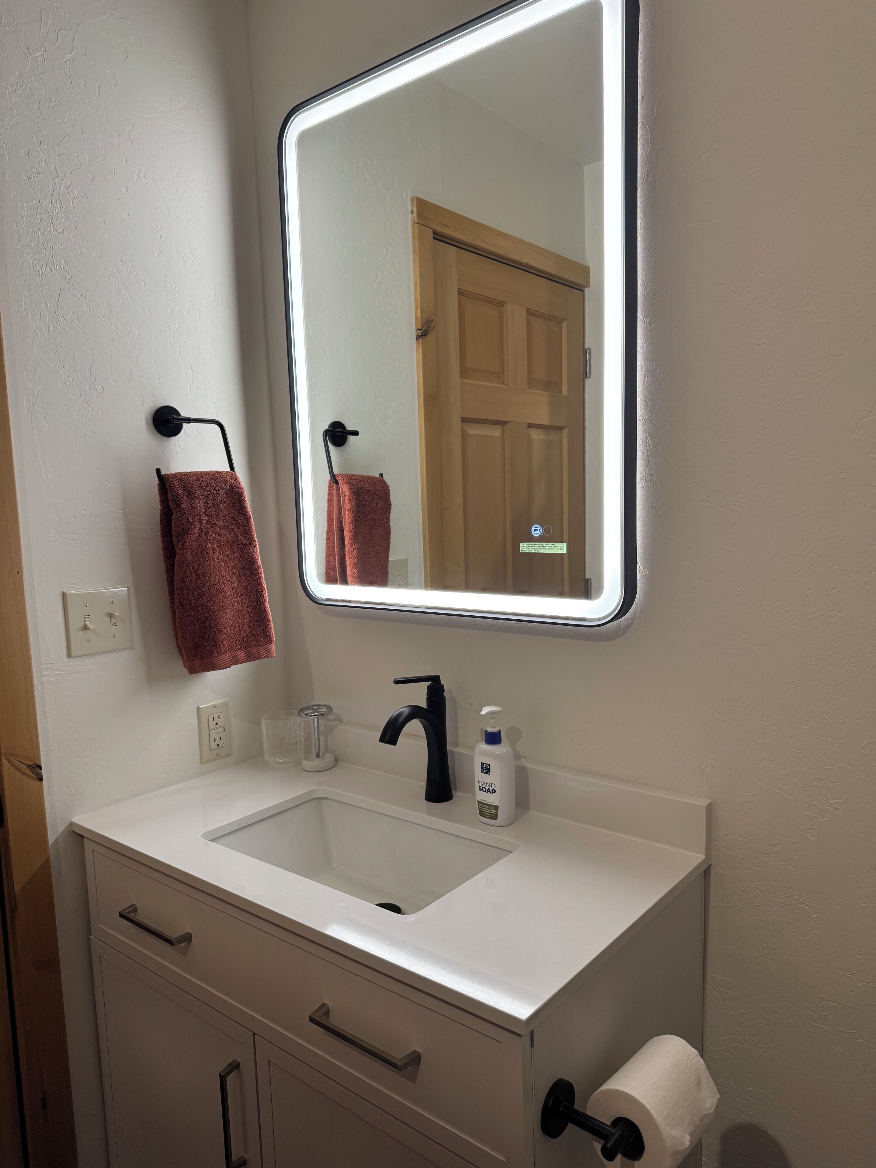 Eco-friendly toiletries, hair dryer, towels, soap