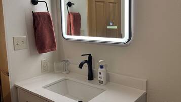 Eco-friendly toiletries, hair dryer, towels, soap