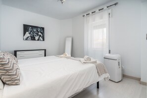 2 dormitorios, tabla de planchar con plancha, wifi gratis y ropa de cama