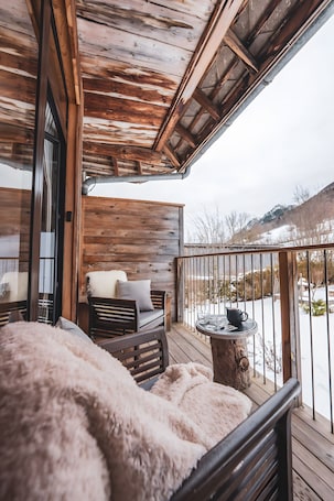 Terrace/patio. Le Fayard Loft – Character Apartment in Renovated Farmhouse, Hot Tub, Mountain Views
