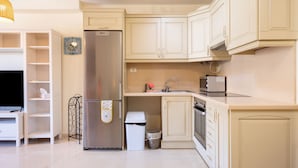 Fridge, microwave, cookware/dishes/utensils