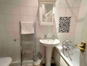 Hair dryer, bidet, towels, soap
