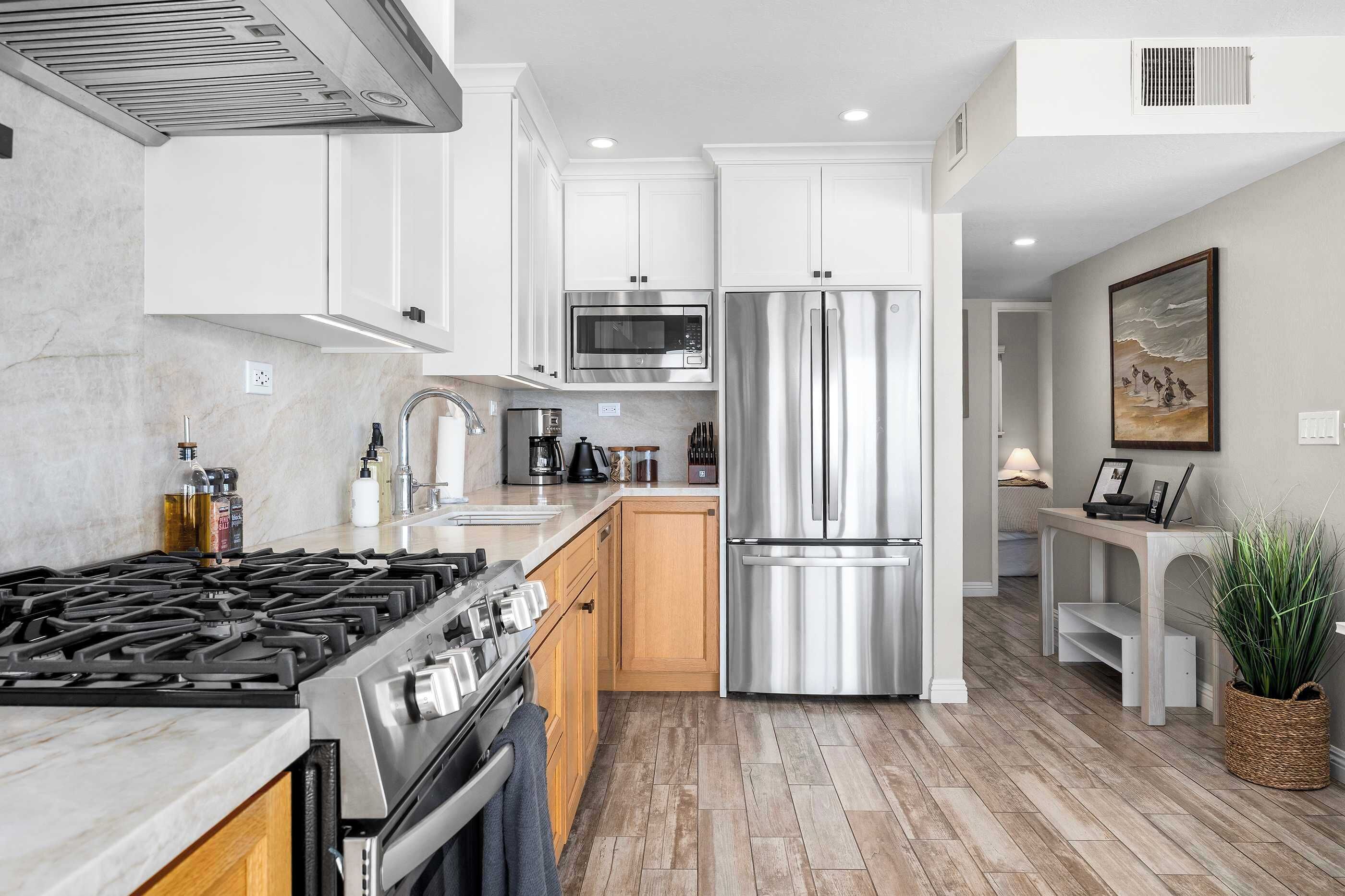Coffee/tea maker, fridge, microwave, oven