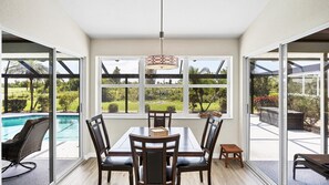 Dining - Oyster Creek Beautiful home in golfing community with water and preserve views, golf cart included (Englewood)