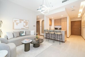 55-inch Smart TV with cable channels - Designer 1BR Apt Fully Equipped (Dubai)