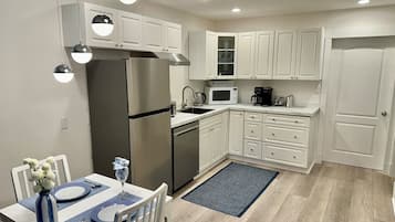 Fridge, microwave, dishwasher, coffee/tea maker