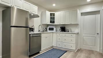 Fridge, microwave, dishwasher, coffee/tea maker