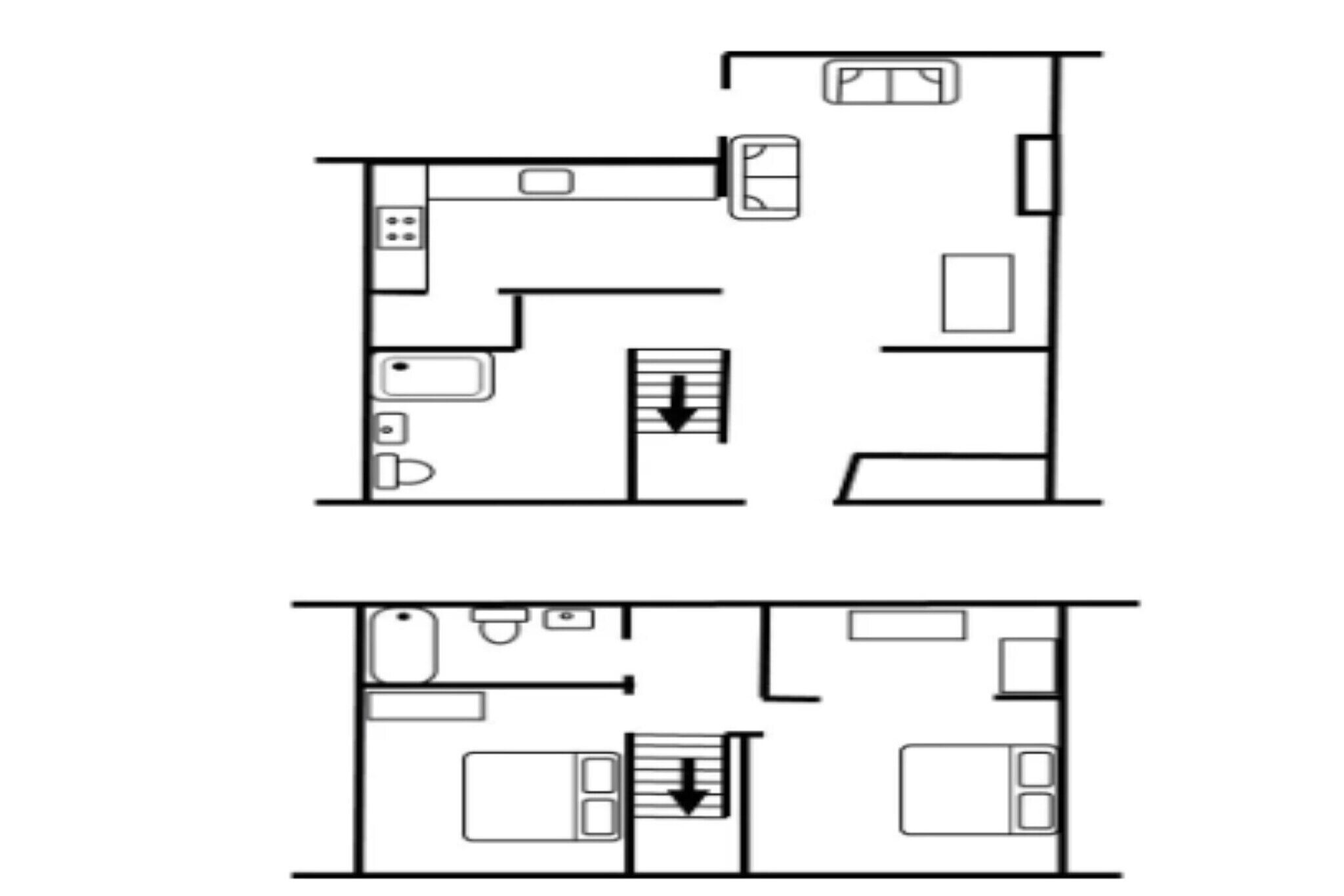 Un plan d’étage d’une chambre d’hôtel comprenant une salle de bain, un coin cuisine et un lit.