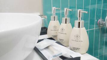 Deluxe Double Room, City View | Bathroom | Shower, hair dryer, bathrobes, slippers