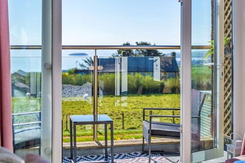 Casa a Mynytho con vista mare e montagne