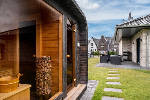 Holiday Home 'Ferienhaus Am See Mit Sauna' with Private Terrace, Private Garden and Wi-Fi