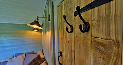 Shepherd’s Hut on Llŷn Peninsula by Private Lake