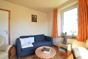 Smart TV, lareira, pebolim, mesa de pingue-pongue