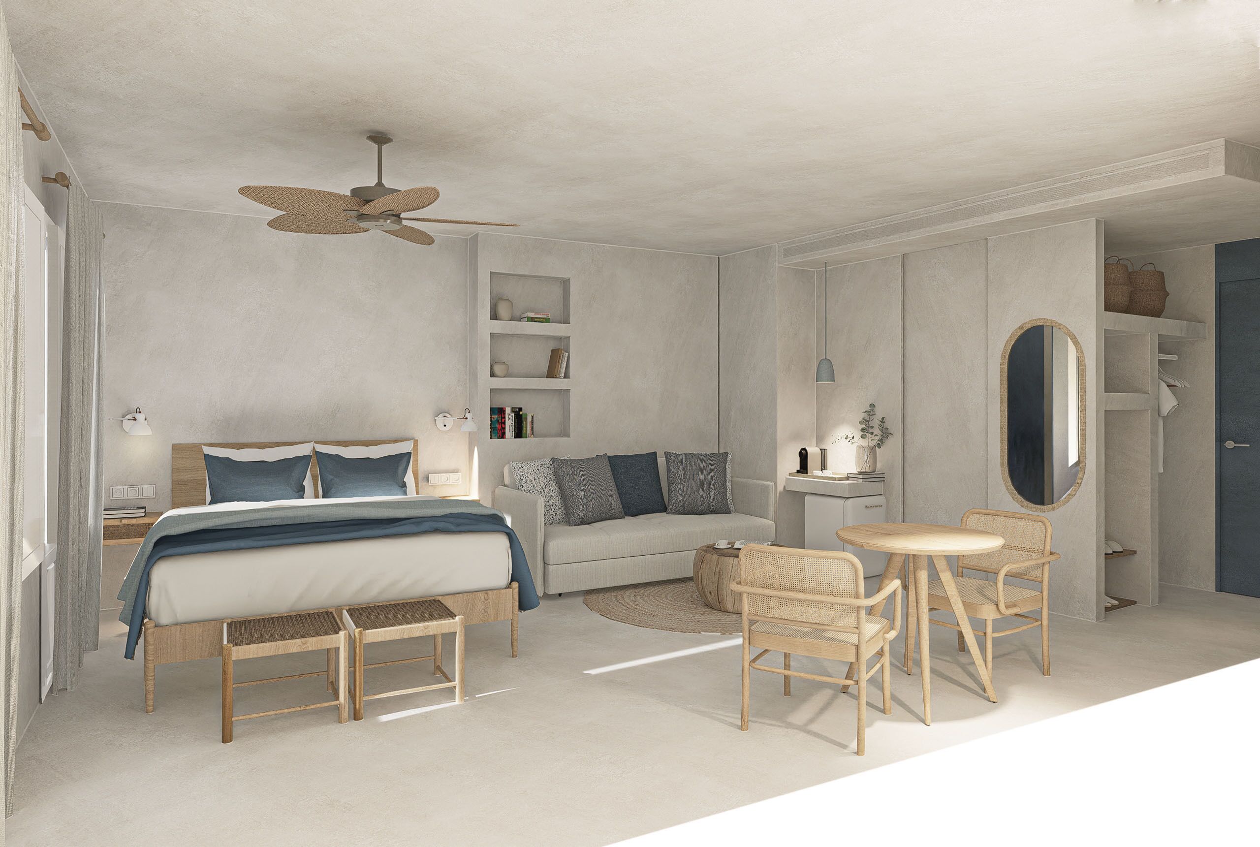 Un dormitorio con cama, mesitas de noche, un sofá, una mesa de comedor con sillas, un ventilador de techo y estanterías empotradas.