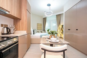 Apartment, Balcony, Lake View | In-room dining