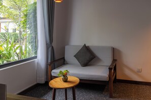 Classic Apartment, Balcony, Garden View | Living area | TV