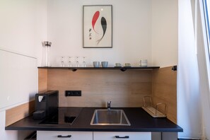 Fridge, microwave, stovetop, coffee/tea maker