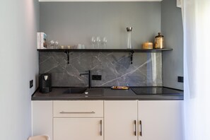 Fridge, microwave, stovetop, coffee/tea maker