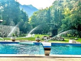 Seasonal outdoor pool, pool umbrellas, sun loungers