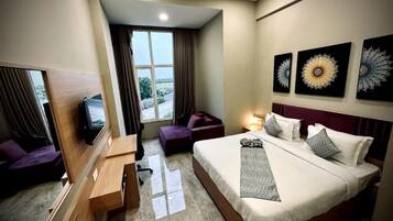 Quarto casal executivo, vista para a piscina | 1 quarto, cofres nos quartos, ferros/tábuas de passar roupa