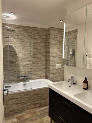 Hair dryer, towels, soap, toilet paper