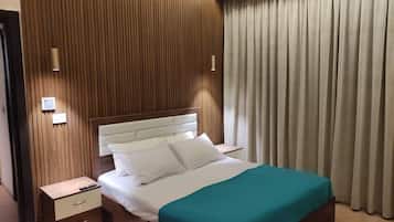 1 chambre, fer et planche Ă repasser, Wi-Fi, draps fournis