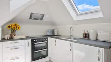 Fridge, microwave, dishwasher, coffee/tea maker