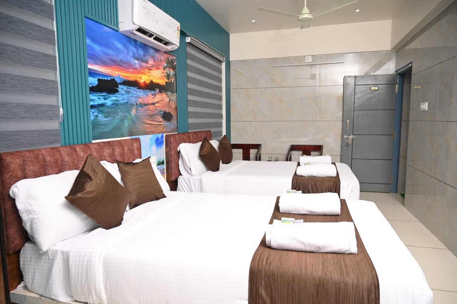 A hotel room with two beds, a large painting of a sunset, an air conditioning unit, and a door marked 209.
