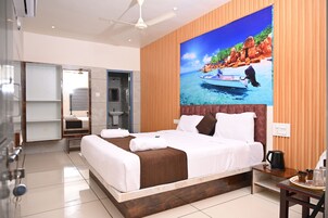 Premium bedding, Select Comfort beds, free minibar items, desk