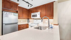 Fridge, microwave, dishwasher, coffee/tea maker