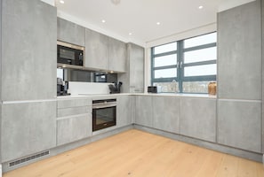 Deluxe Apartment, Balcony | Private kitchen