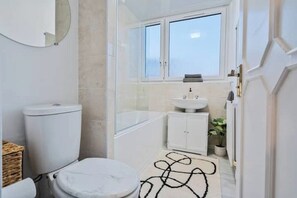 Hair dryer, bidet, towels, soap