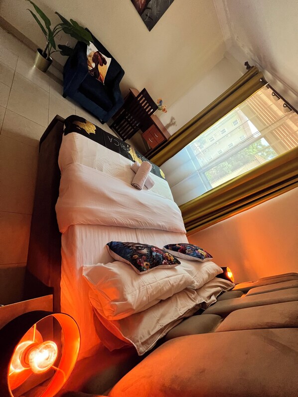 1 habitación, tabla de planchar con plancha, wifi y ropa de cama 