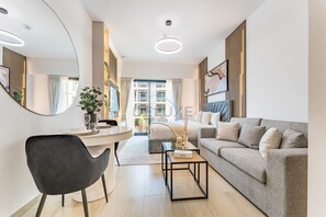 In-room safe, iron/ironing board, free WiFi, bed sheets - Pool and Community View 1BR with Balcony Near Park, Pantheon Elysee II (Dubai)